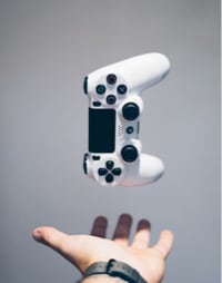 white controller, turned 90 degrees to the left, floating